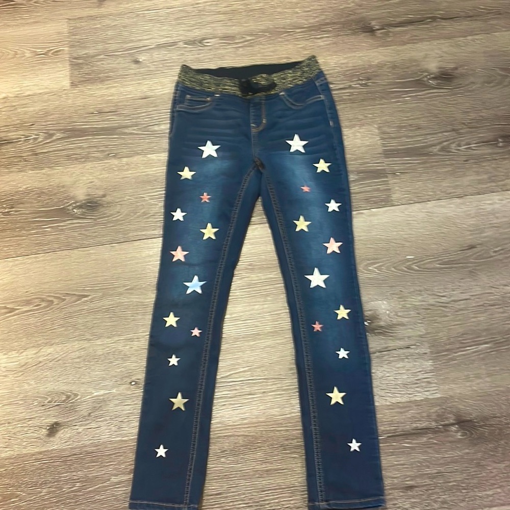 Stared girls jeans